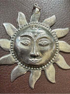 Vintage sterling silver sun pendant